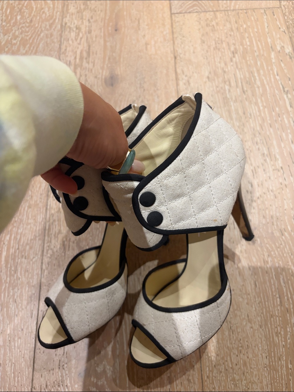 Chanel Women's Cream Quilted Peep-Toe Heels with Black Trim. Authentic with box